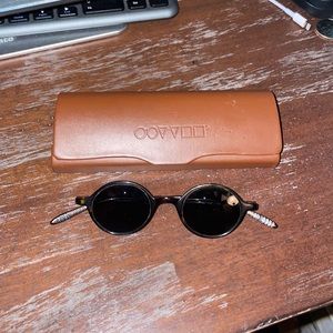 Oliver Peoples OP654 362 round rim sunglasses. Brown tortoise.
